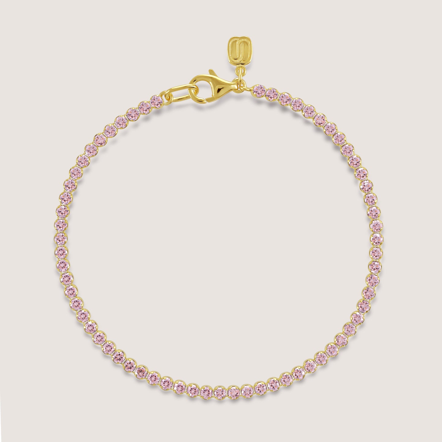 White Background - Front of KiraKira Tennis Bracelet Pink | 925 Silver Gold Plated from Nishani’s Kira Kira festive collection — handcrafted bracelet in gold-plated 925 silver.