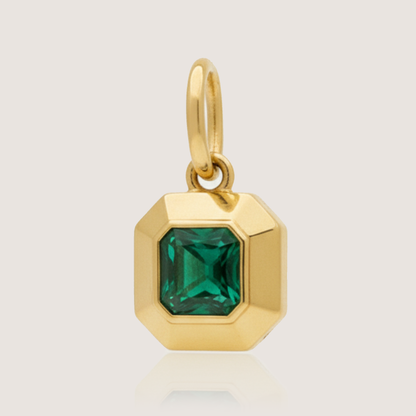 White Background - Close-up of KiraKira Emerald Charm | 925 Silver Gold-Plated from Nishani’s Kira Kira festive collection — handcrafted emerald jewelry, charm in gold-plated 925 silver.