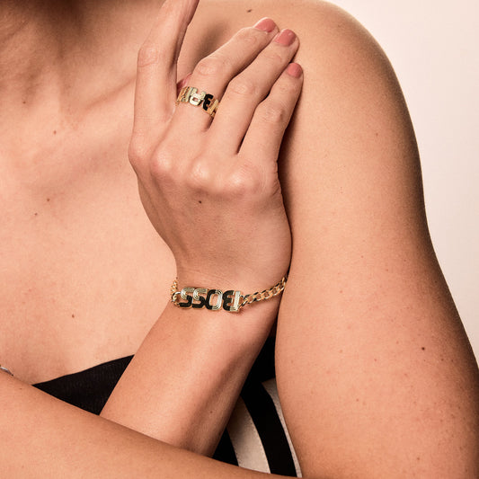 Elegant gold-plated Boss bracelet crafted in 925 silver, perfect for confident women with a modern edge.