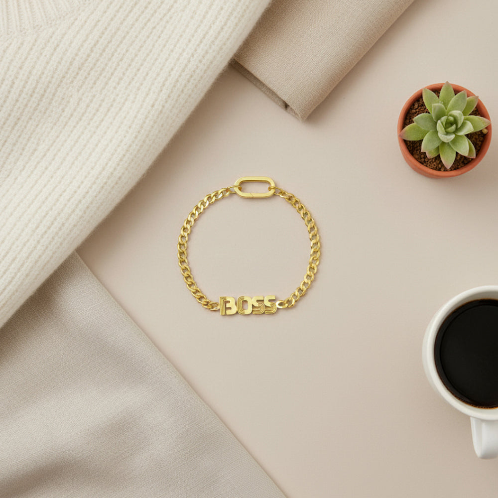 Elegant gold-plated Boss bracelet crafted in 925 silver, perfect for confident women with a modern edge.