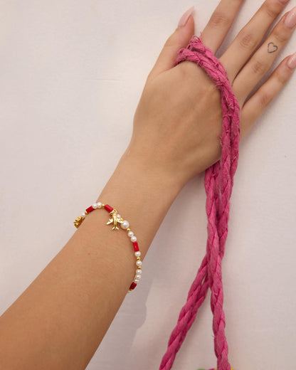 Gold-plated 925 silver bracelet from the Enishi collection, vibrant and symbolic of connection — model - close-up shot.