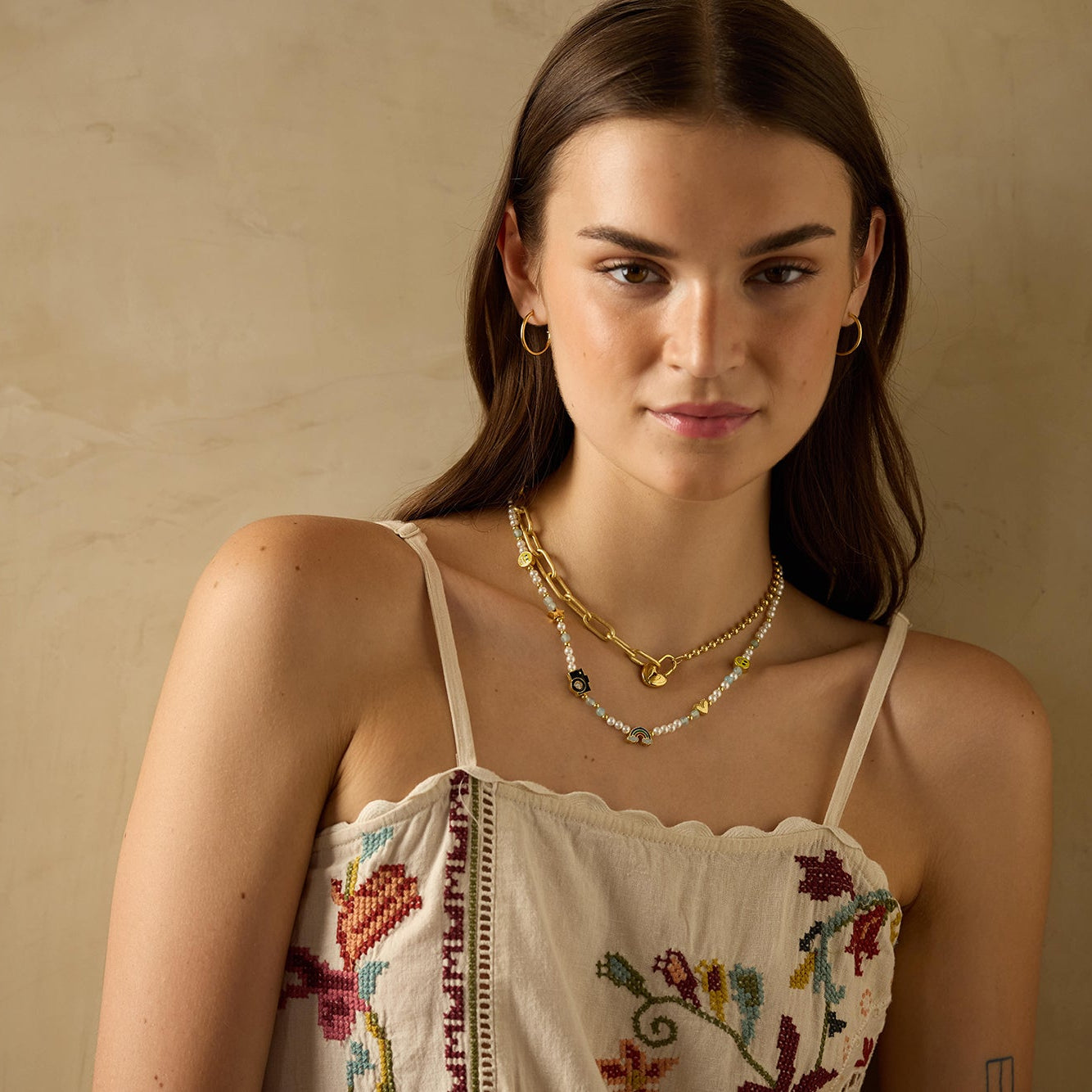 Gold-plated 925 silver heart lock from the Enishi collection, symbolizing love and unity — model - full look shot.