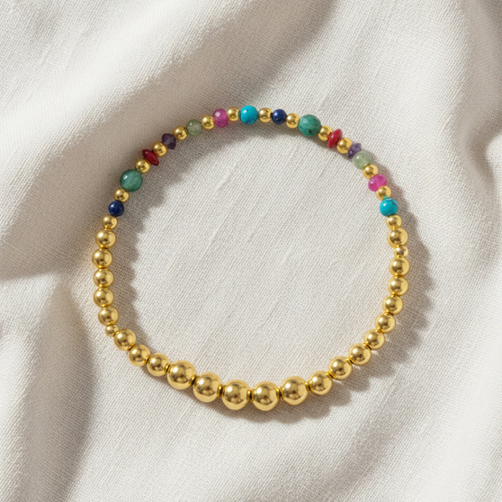 Gold-plated 925 silver bracelet from the Enishi collection, vibrant and symbolic of connection — flat lay shot.