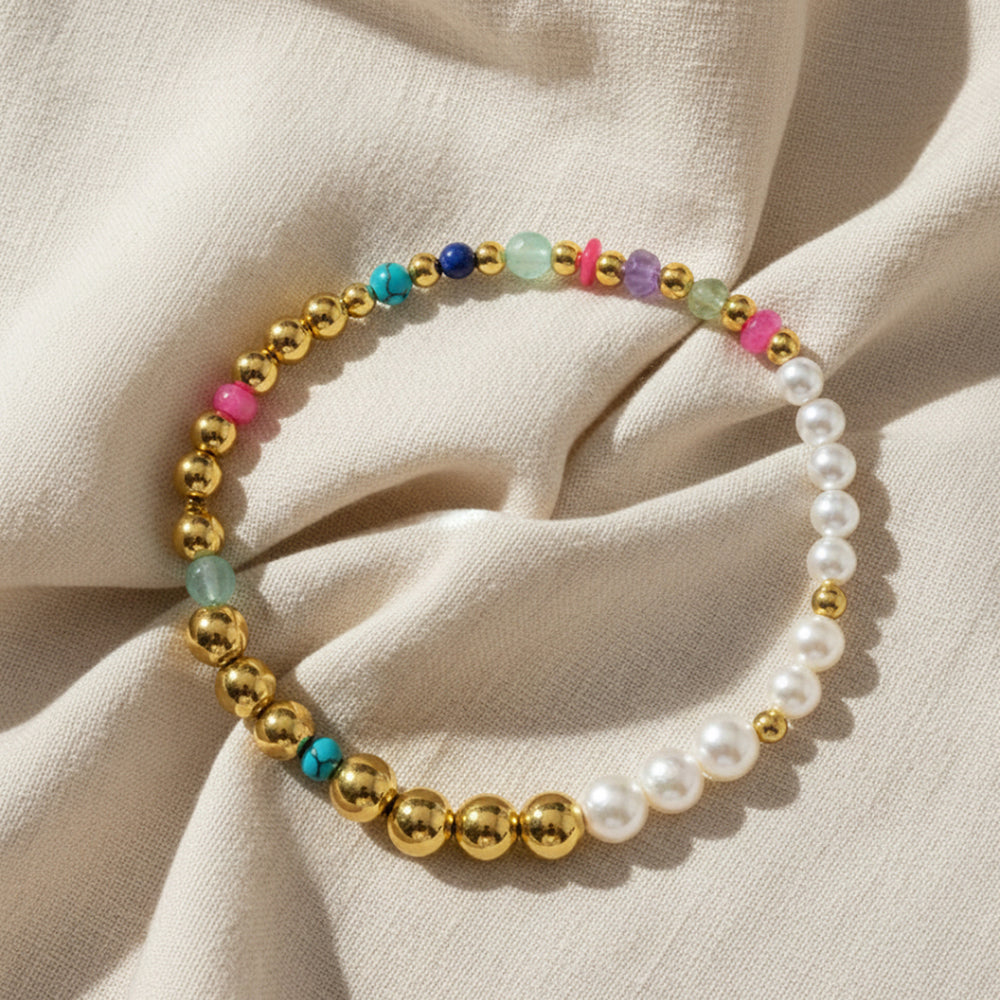 Gold-plated 925 silver bracelet from the Enishi collection, vibrant and symbolic of connection — flat lay shot.