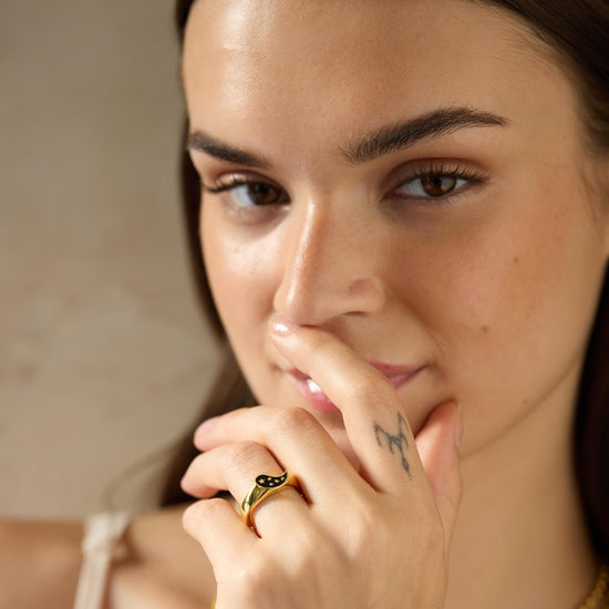 Gold-plated 925 silver ring from the Enishi collection, youthful dual-tone design celebrating bonds — model - close-up shot.