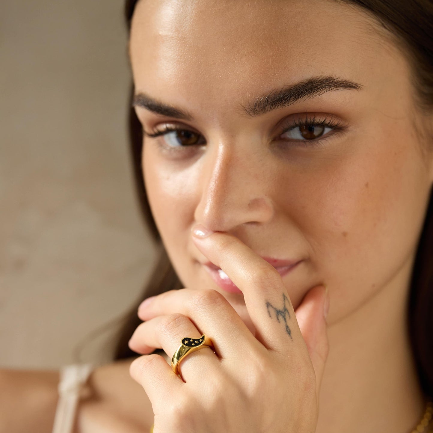 Gold-plated 925 silver ring from the Enishi collection, youthful dual-tone design celebrating bonds — model - close-up shot.