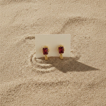 Flat Lay 2 of KiraKira Suits Stud Earrings | 925 Silver Gold-Plated from Nishani’s Kira Kira festive collection — handcrafted earrings in gold-plated 925 silver.