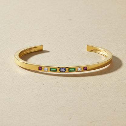 Flat Lay of KiraKira Multi-Colour Cuff | 925 Silver Gold-Plated CZ from Nishani’s Kira Kira festive collection — handcrafted multicolour stones jewelry, bracelet in gold-plated 925 silver.