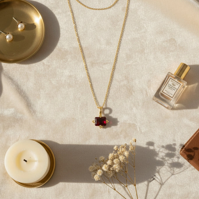 Flat Lay of KiraKira Ruby Suits Necklace | 925 Silver Gold-Plated from Nishani’s Kira Kira festive collection — handcrafted ruby jewelry, necklace in gold-plated 925 silver.