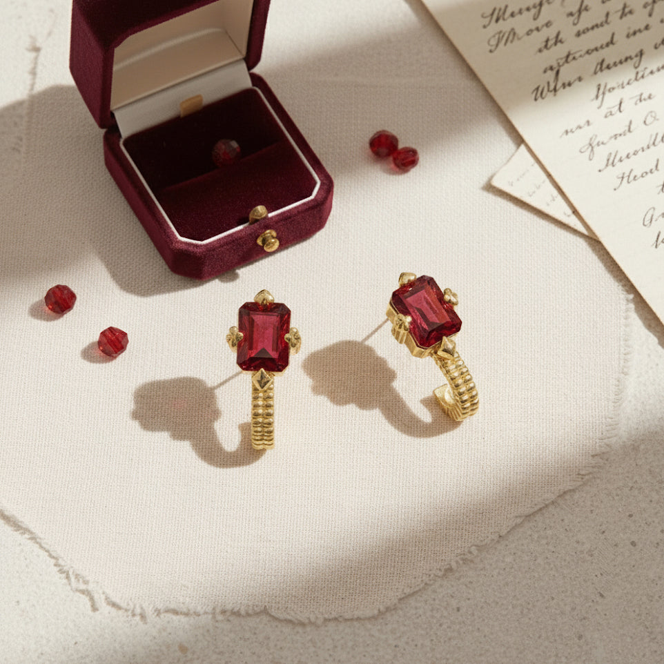 Flat Lay of KiraKira Suits Stud Earrings | 925 Silver Gold-Plated from Nishani’s Kira Kira festive collection — handcrafted earrings in gold-plated 925 silver.