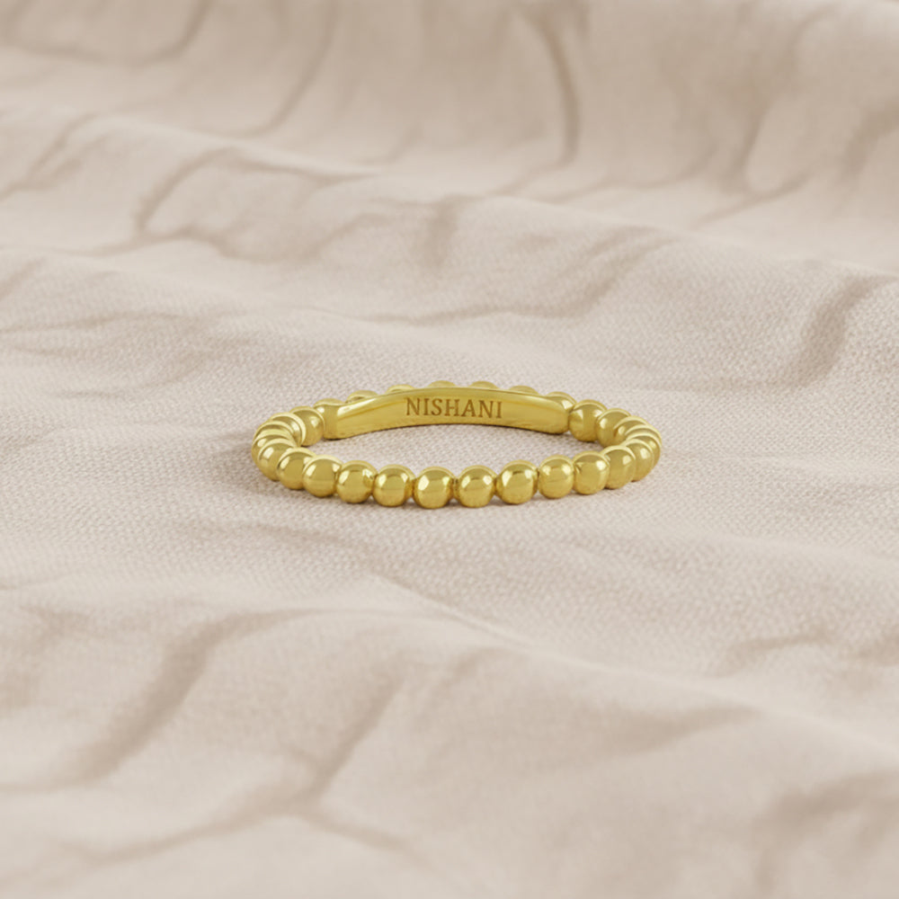 Flat Lay of Ukiyo Ball Ring — a minimal, gold-plated 925 silver design crafted for everyday wear from Nishani’s Ukiyo collection.