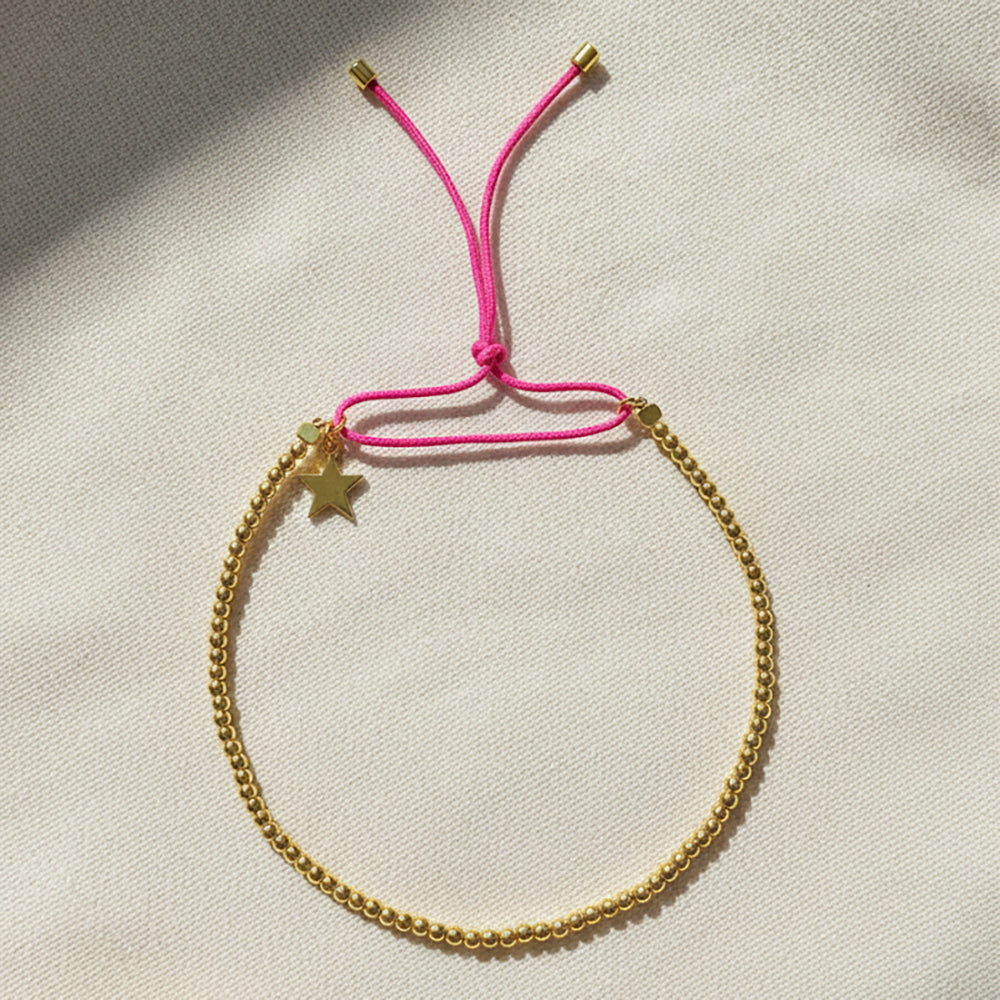 Flat Lay of Ukiyo Beaded Thread Bracelet — a minimal, gold-plated 925 silver design crafted for everyday wear from Nishani’s Ukiyo collection.