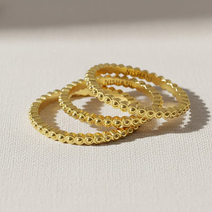 Flat Lay of Ukiyo Trio Ball Rings — a minimal, gold-plated 925 silver design crafted for everyday wear from Nishani’s Ukiyo collection.