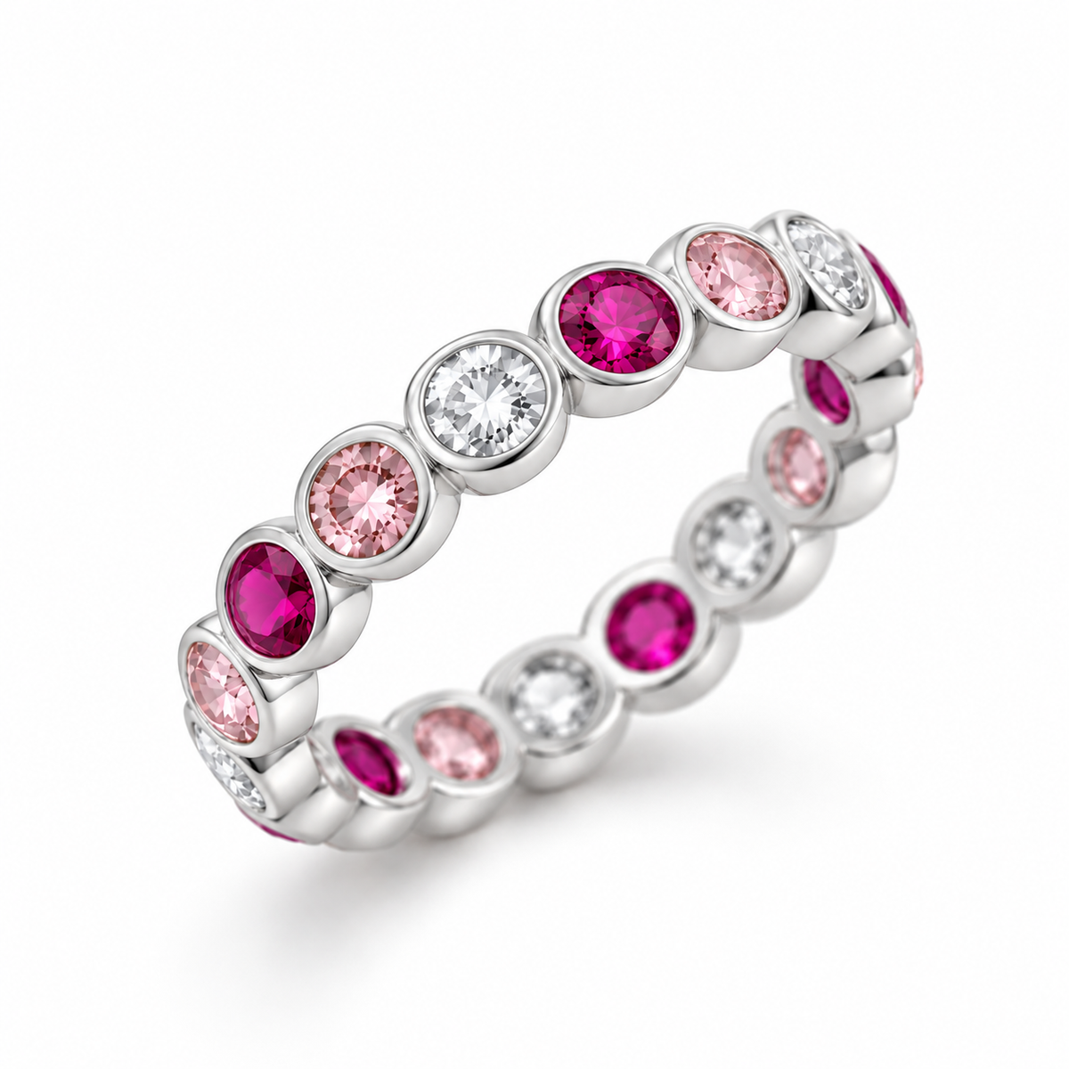 A silver eternity band ring featuring alternating round pink gemstones and clear round-cut stones, shown on a clean white background.