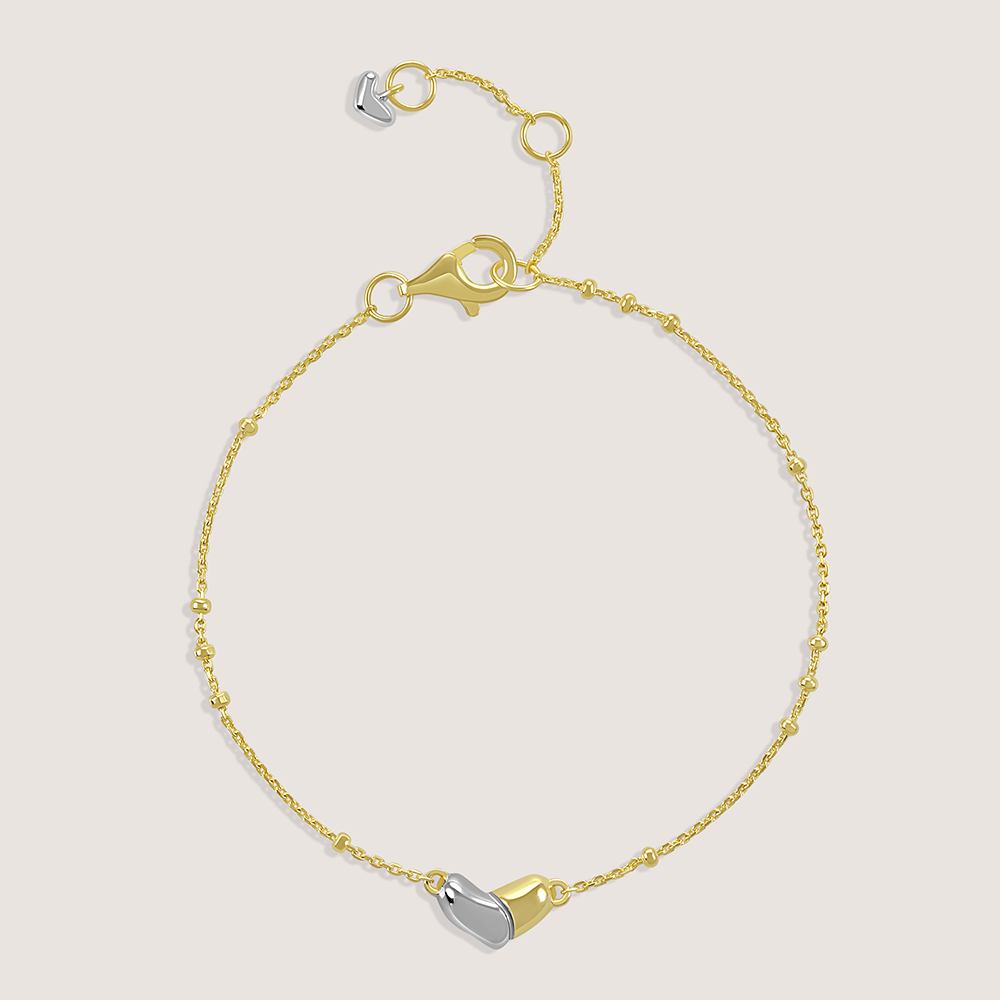 Gold and rhodium organic heart bracelet in 925 silver, sculptural and romantic — product - front shot.