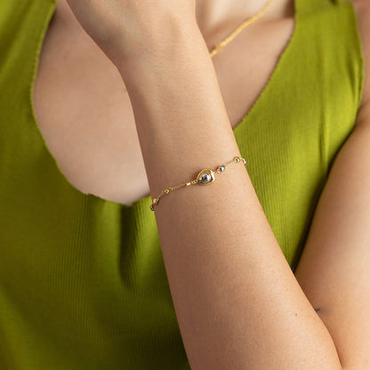 Gold and rhodium puffed bracelet in 925 silver, statement dual-tone wristwear — model - full look shot.