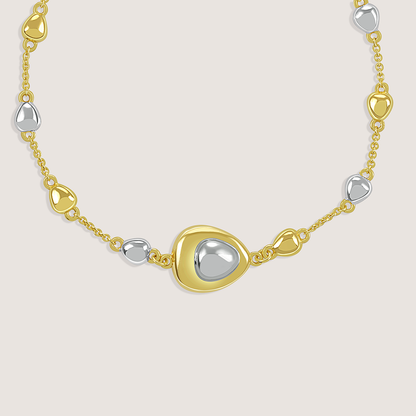 Gold and rhodium puffed bracelet in 925 silver, statement dual-tone wristwear — product - side shot.