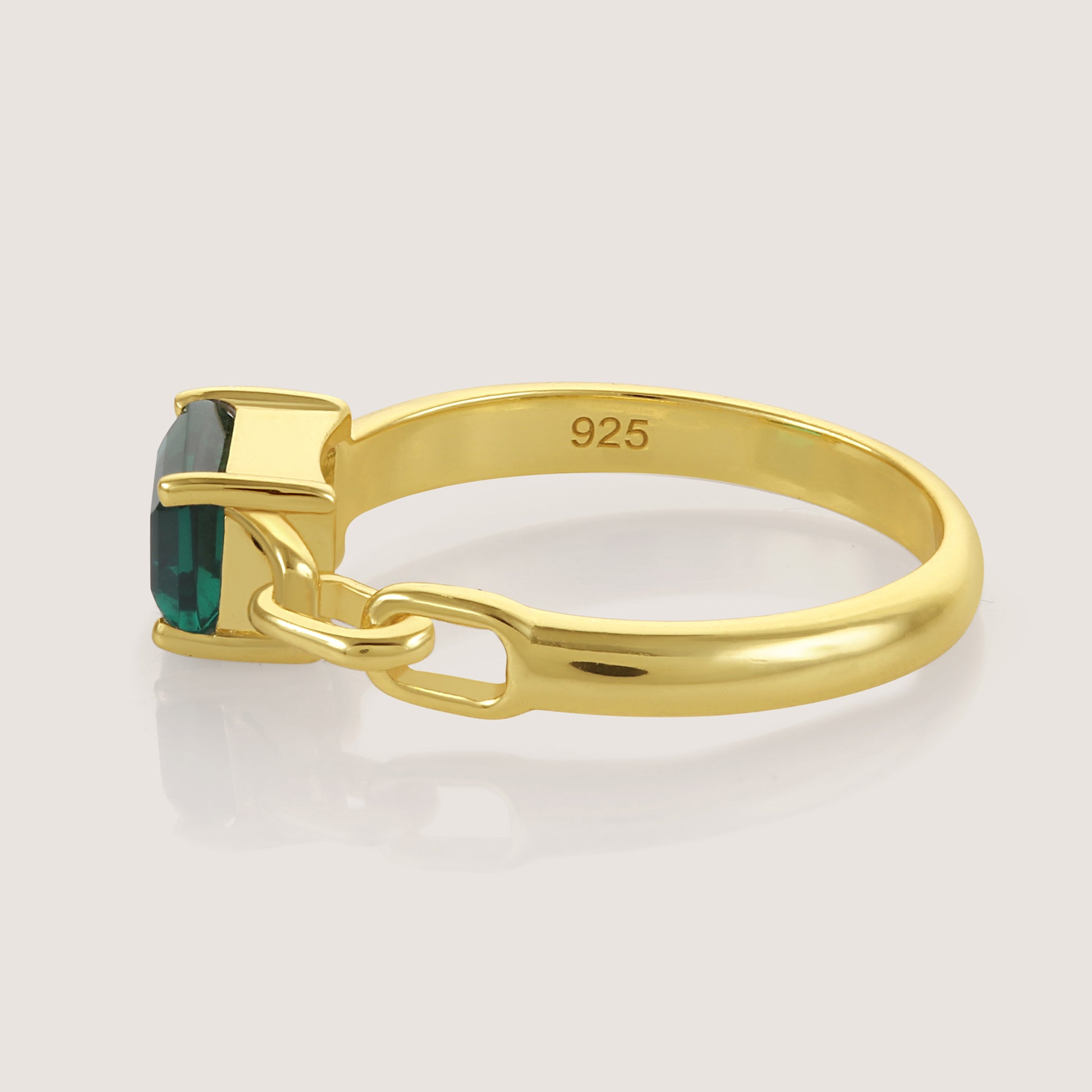 White Background - Side of KiraKira Emerald Ring | 925 Silver Gold-Plated from Nishani’s Kira Kira festive collection — handcrafted emerald jewelry, ring in gold-plated 925 silver.