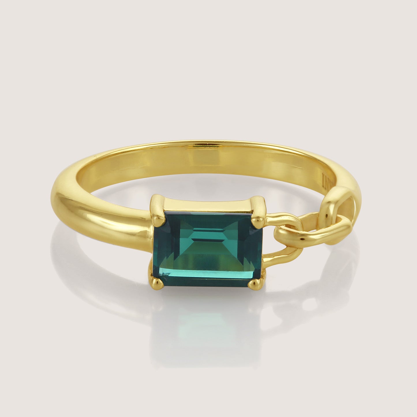 White Background - Close-up of KiraKira Emerald Ring | 925 Silver Gold-Plated from Nishani’s Kira Kira festive collection — handcrafted emerald jewelry, ring in gold-plated 925 silver.