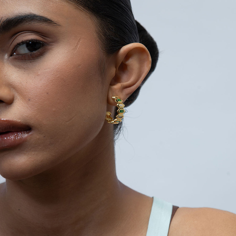 Model Image 1 of KiraKira Hoops | Gold-Plated Jewellery with Emeralds from Nishani’s Kira Kira festive collection — handcrafted emerald jewelry, earrings in gold-plated 925 silver.