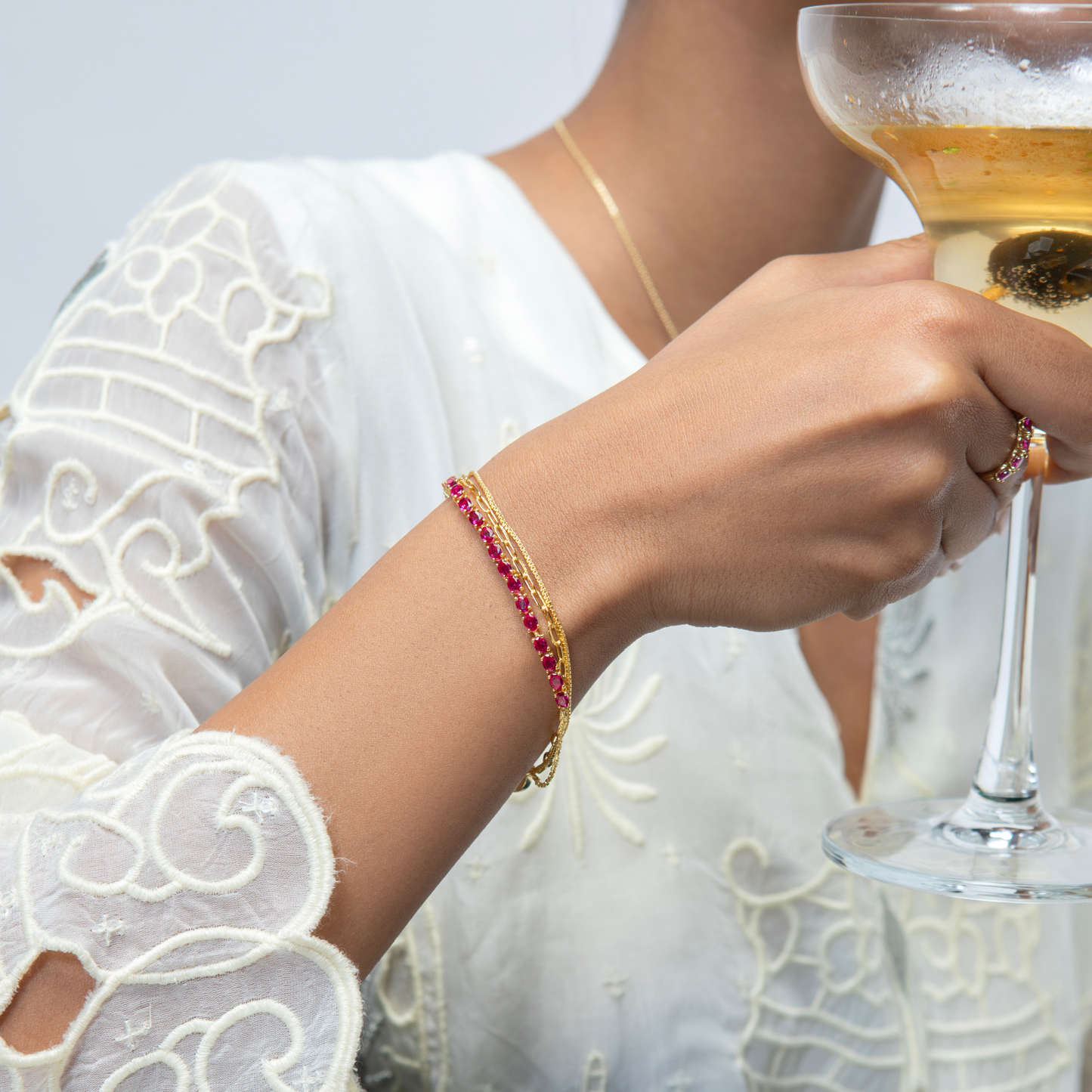 Model Image 1 of KiraKira Layered Bracelet | 925 Silver Gold Plated from Nishani’s Kira Kira festive collection — handcrafted bracelet in gold-plated 925 silver.