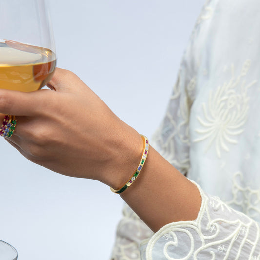Model Image 1 of KiraKira Multi-Colour Cuff | 925 Silver Gold-Plated CZ from Nishani’s Kira Kira festive collection — handcrafted multicolour stones jewelry, bracelet in gold-plated 925 silver.