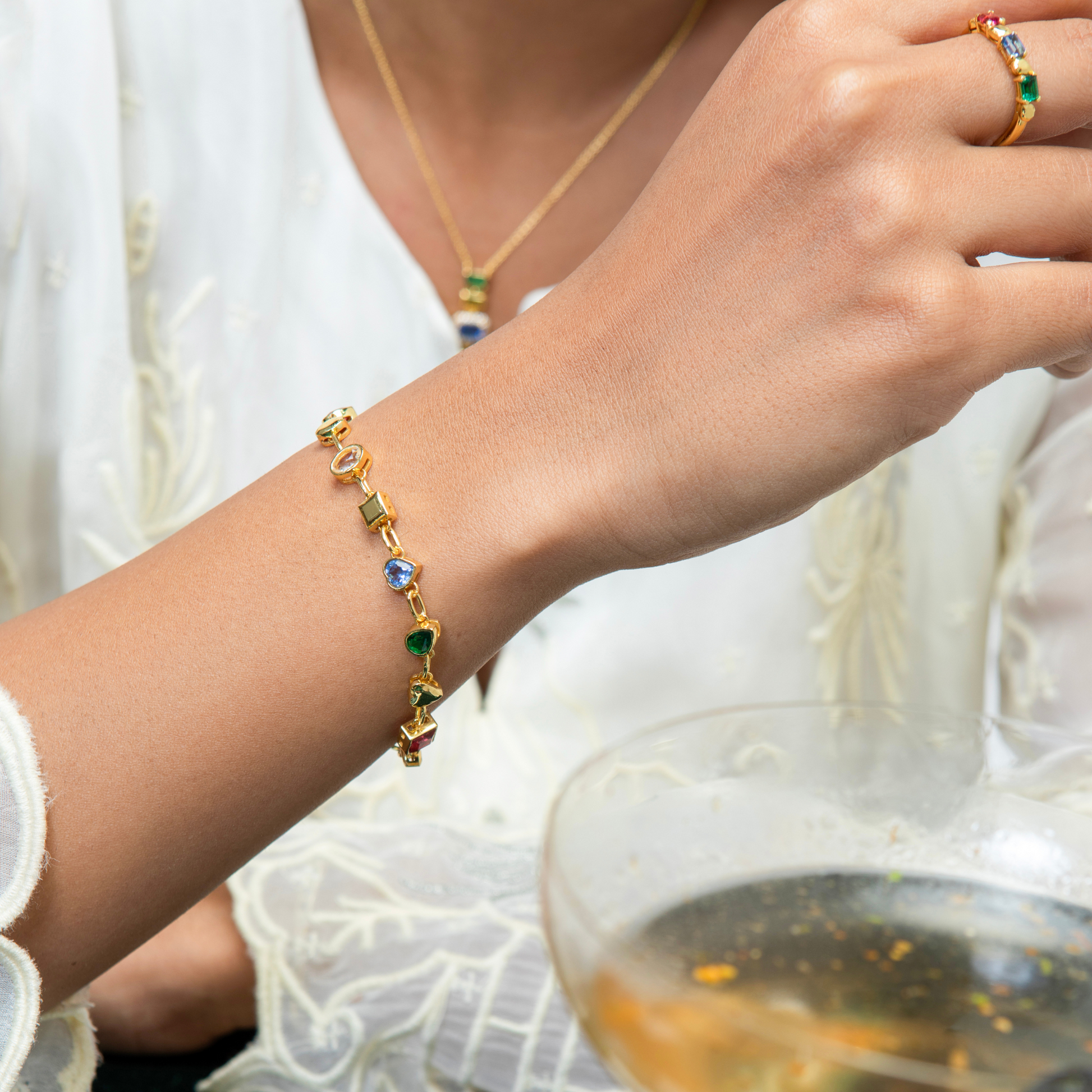 Model Image 1 of KiraKira Multi Stone Bracelet | 925 Silver Gold & Rhodium-Plated from Nishani’s Kira Kira festive collection — handcrafted bracelet in gold-plated 925 silver.