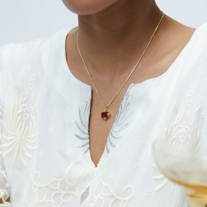 Model Image 1 of KiraKira Ruby Suits Necklace | 925 Silver Gold-Plated from Nishani’s Kira Kira festive collection — handcrafted ruby jewelry, necklace in gold-plated 925 silver.