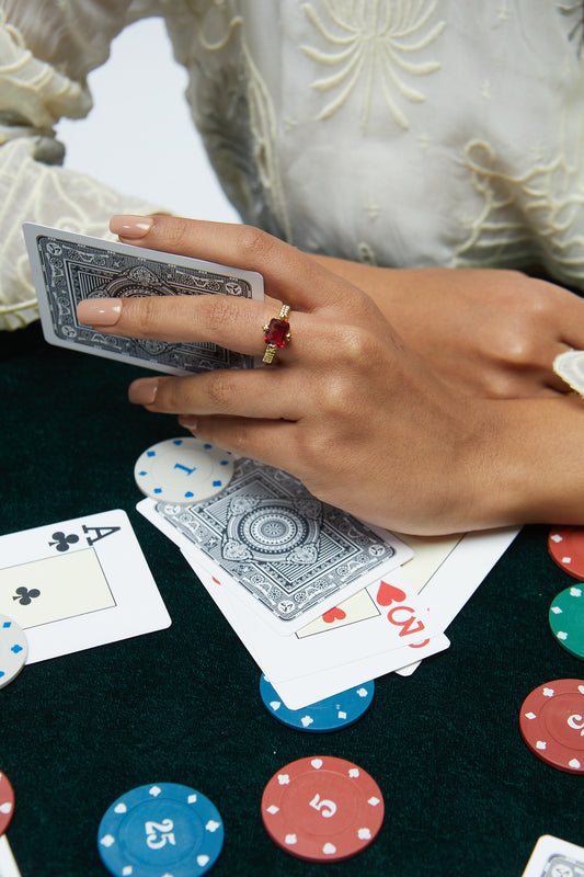 Model Image 1 of KiraKira Ruby Suits Ring | 925 Silver Gold-Plated from Nishani’s Kira Kira festive collection — handcrafted ruby jewelry, ring in gold-plated 925 silver.