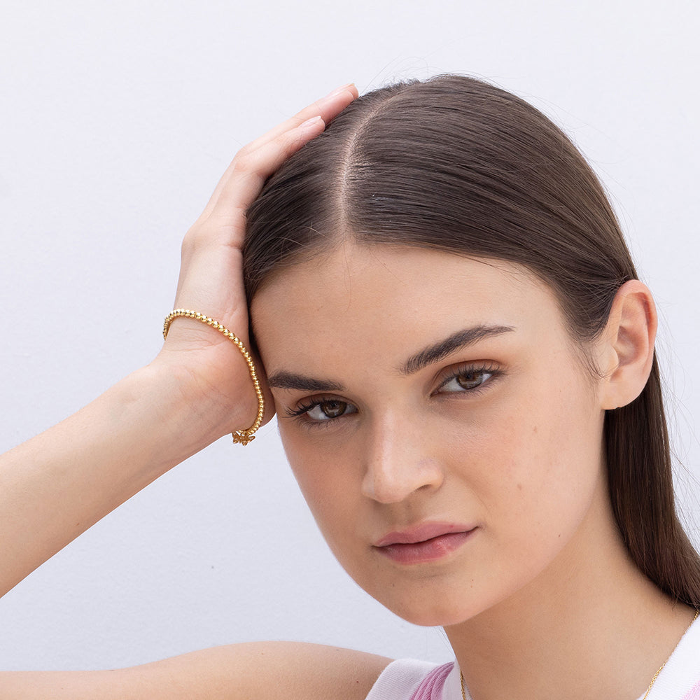 Model Image 1 of Ukiyo Butterfly Charm Bracelet — a minimal, gold-plated 925 silver design crafted for everyday wear from Nishani’s Ukiyo collection.
