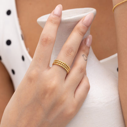 Model Image 1 of Ukiyo Trio Ball Rings — a minimal, gold-plated 925 silver design crafted for everyday wear from Nishani’s Ukiyo collection.