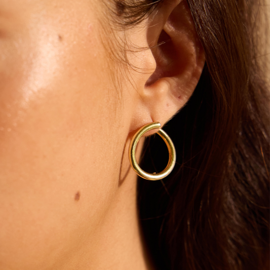 Model Image 1 of Ukiyo Wrap Around Studs — a minimal, gold-plated 925 silver design crafted for everyday wear from Nishani’s Ukiyo collection.