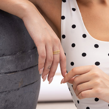 Model Image 2 of Ukiyo Trio Ball Rings — a minimal, gold-plated 925 silver design crafted for everyday wear from Nishani’s Ukiyo collection.