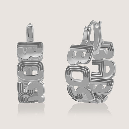 Rhodium-plated Boss Babe earrings in 925 silver, bold and empowering for every occasion.