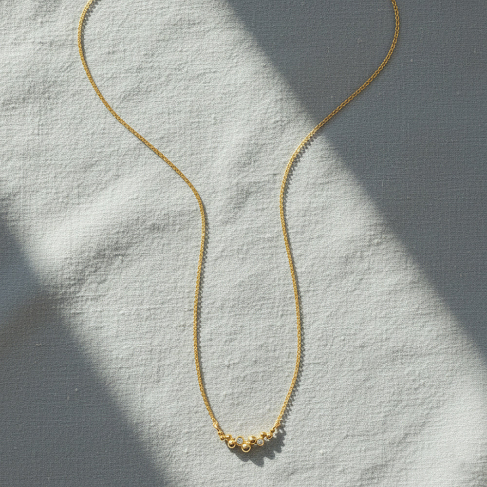 Ukiyo Ball Necklace — a minimal, gold-plated 925 silver design crafted for everyday wear from Nishani’s Ukiyo collection.