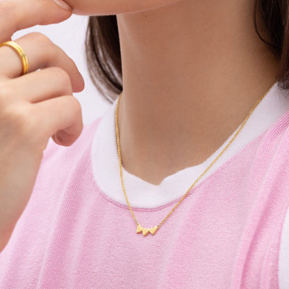 Ukiyo Triple Heart Necklace — a minimal, gold-plated 925 silver design crafted for everyday wear from Nishani’s Ukiyo collection.