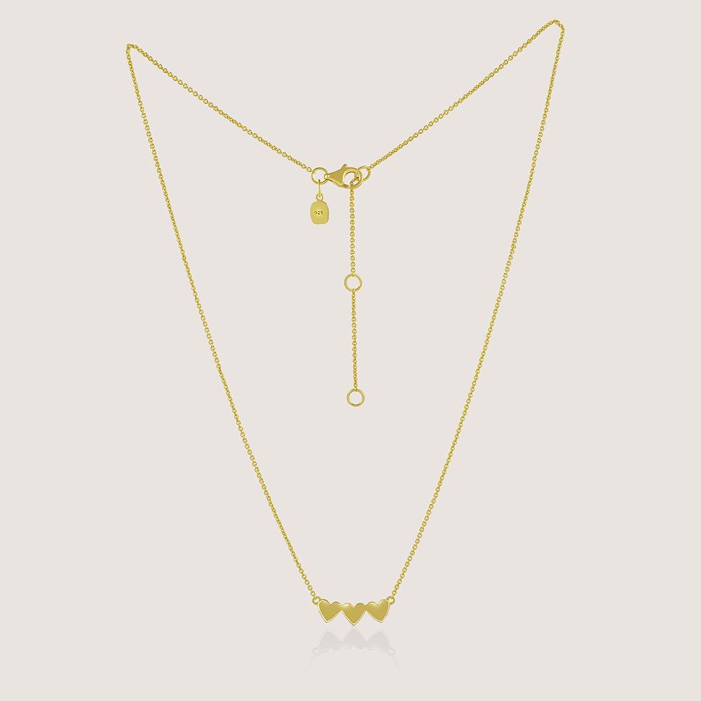 Ukiyo Triple Heart Necklace — a minimal, gold-plated 925 silver design crafted for everyday wear from Nishani’s Ukiyo collection.