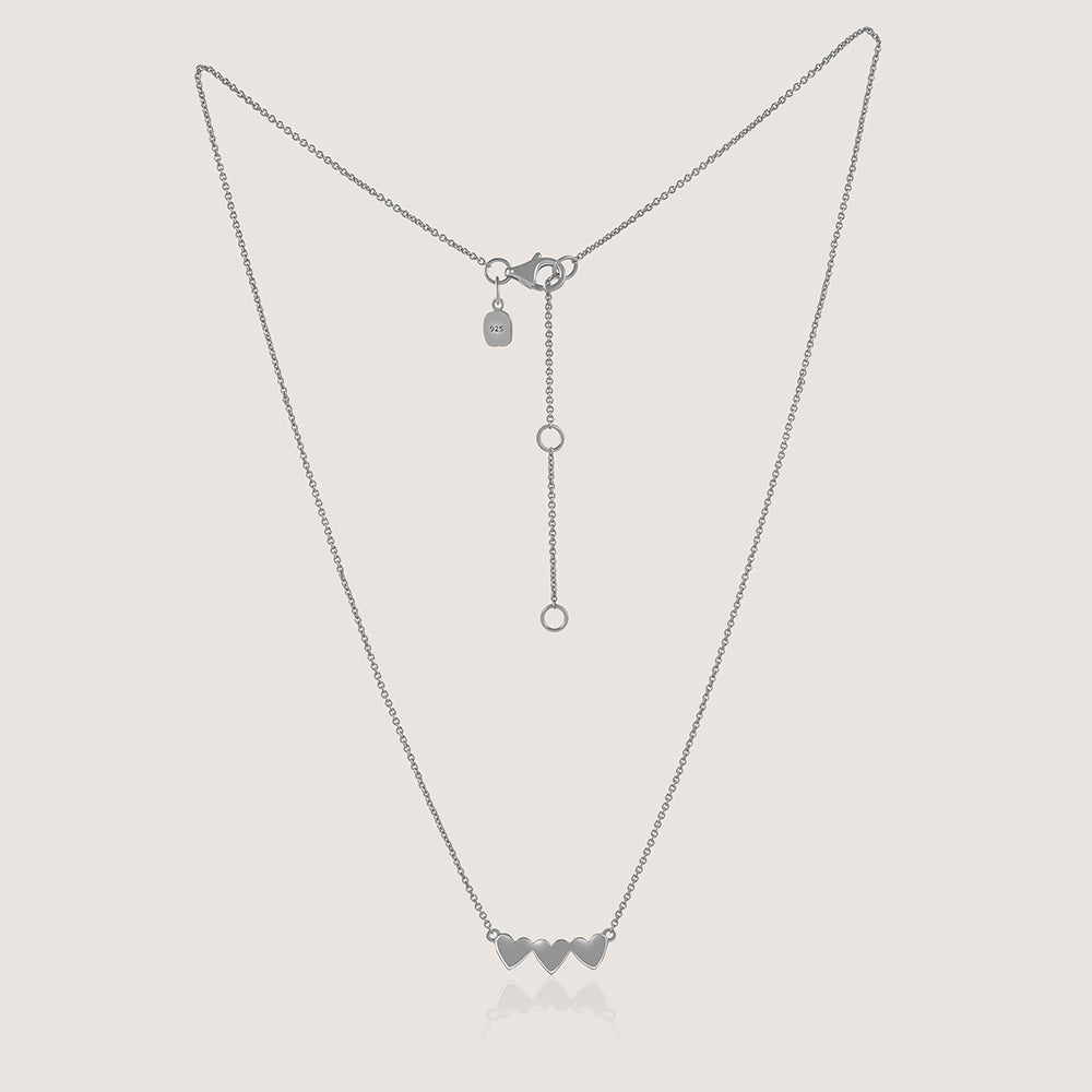 Ukiyo Triple Heart Necklace — a minimal, rhodium-plated 925 silver design crafted for everyday wear from Nishani’s Ukiyo collection.