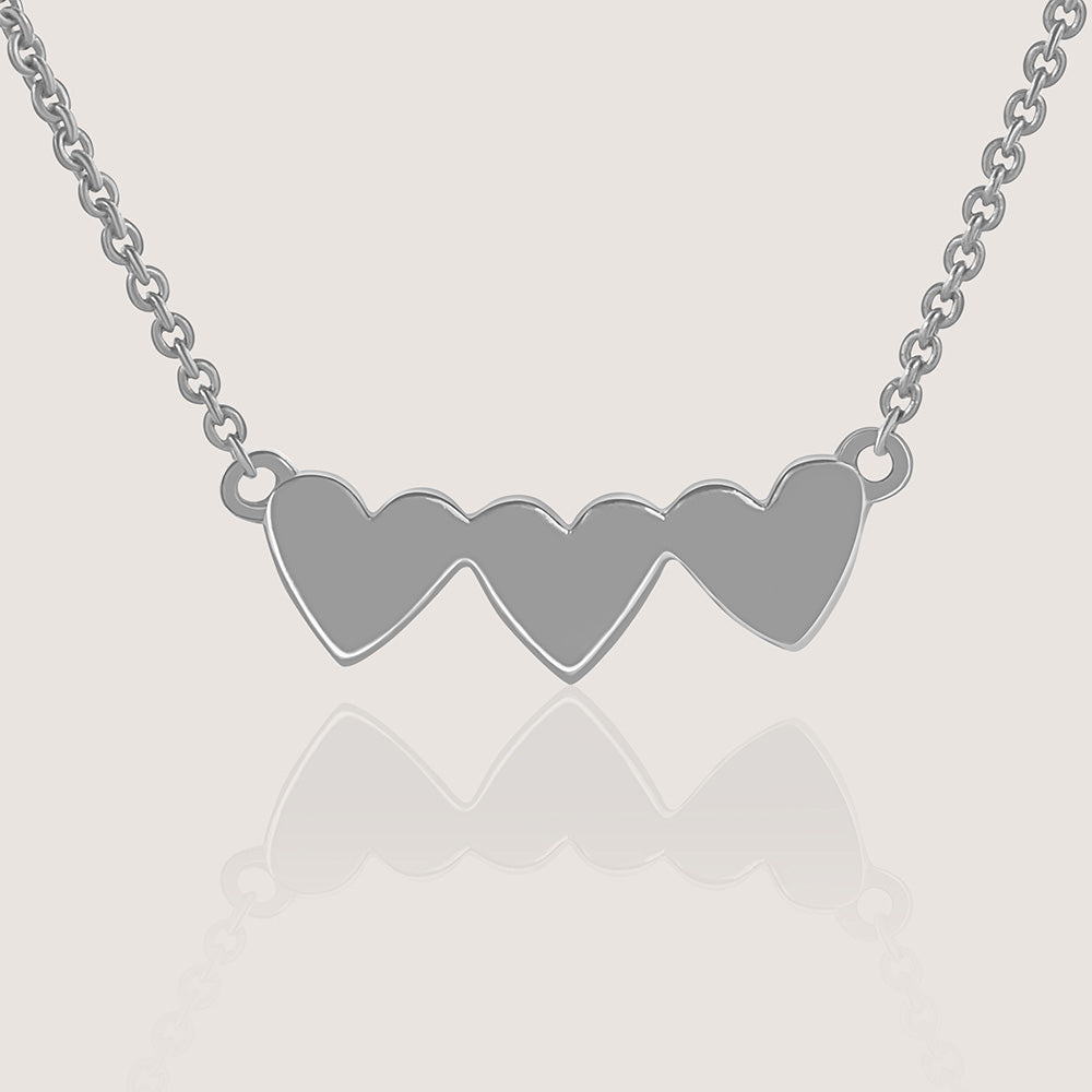 Ukiyo Triple Heart Necklace — a minimal, rhodium-plated 925 silver design crafted for everyday wear from Nishani’s Ukiyo collection.