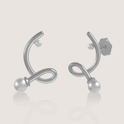 Ukiyo twisted pearl earrings — a minimal, rhodium-plated 925 silver design crafted for everyday wear from Nishani’s Ukiyo collection.