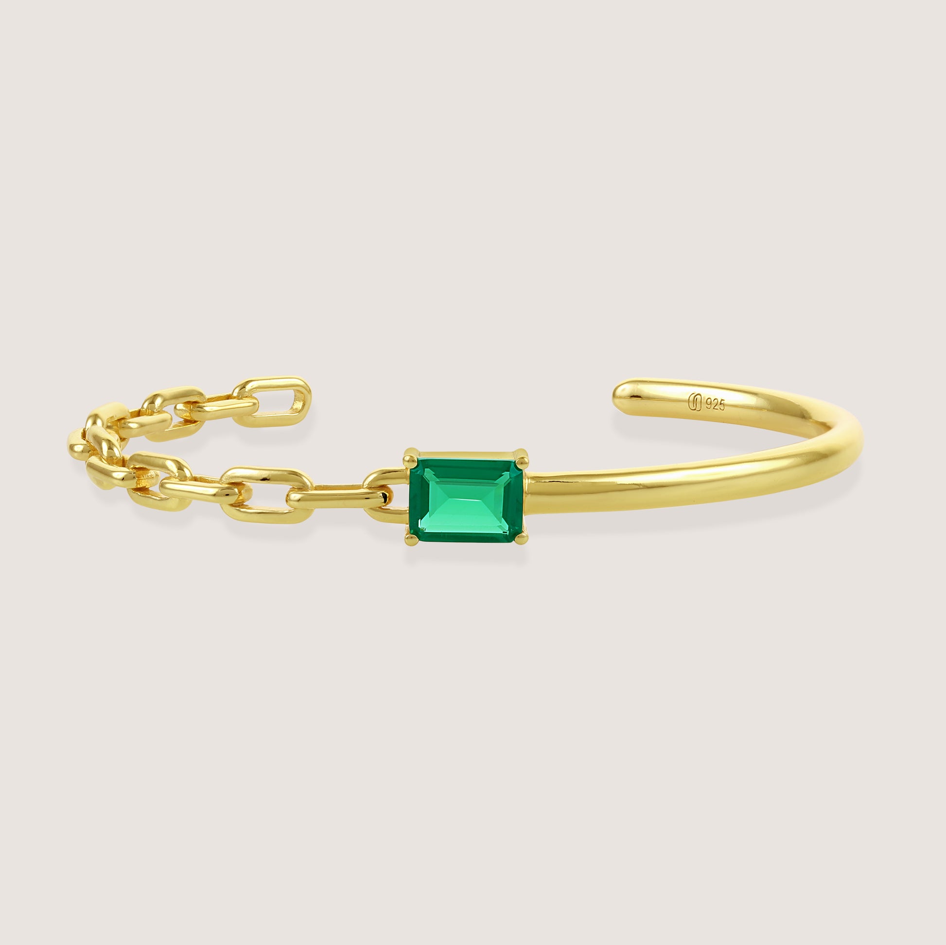 White Background - Close-up of KiraKira Emerald Cuff | 925 Silver Gold-Plated from Nishani’s Kira Kira festive collection — handcrafted emerald jewelry, bracelet in gold-plated 925 silver.