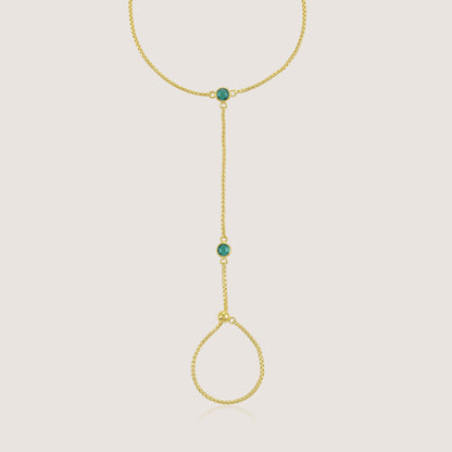 White Background - Close-up of KiraKira Emerald Hand Chain | 925 Silver Gold-Plated from Nishani’s Kira Kira festive collection — handcrafted emerald jewelry, bracelet in gold-plated 925 silver.