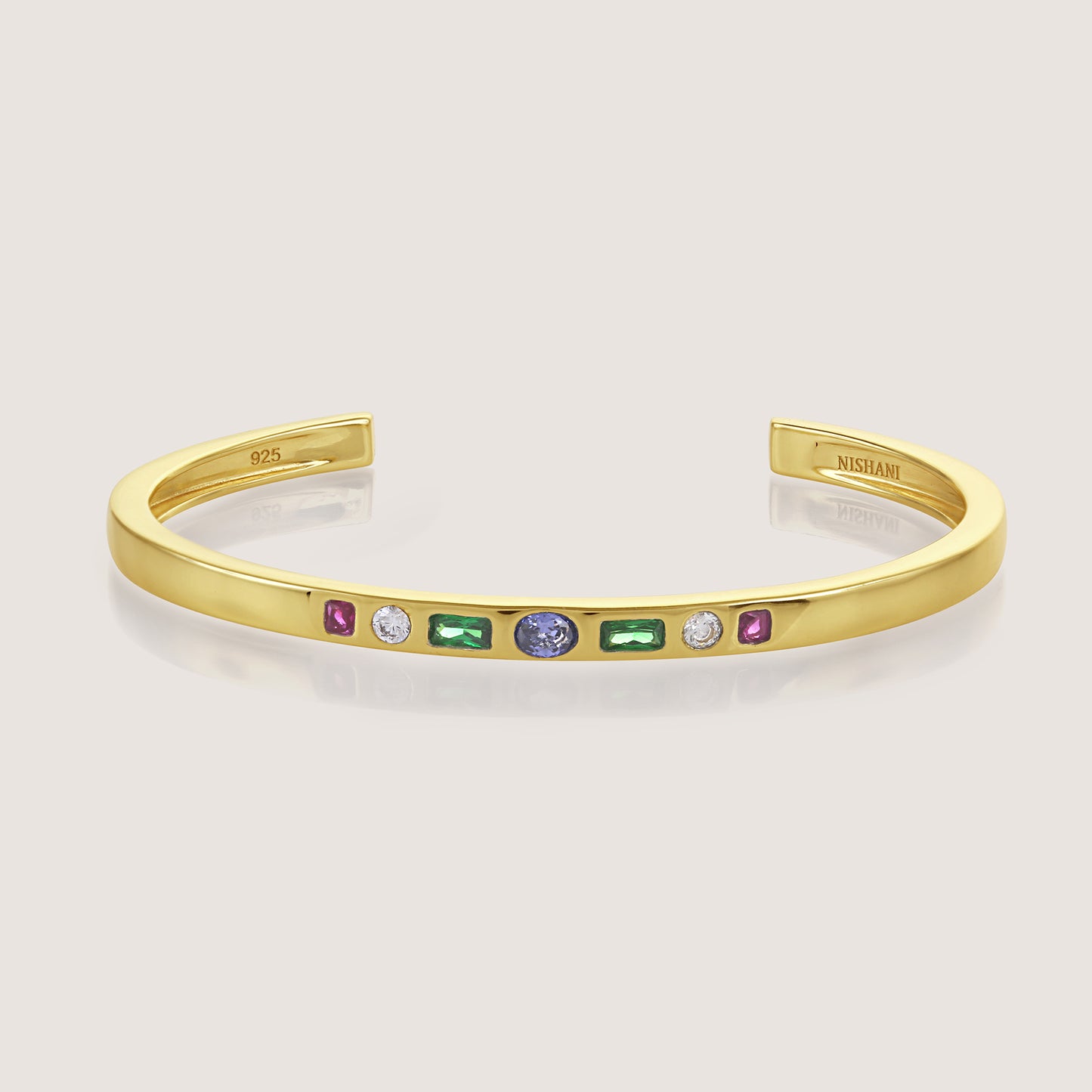 White Background - Close-up of KiraKira Multi-Colour Cuff | 925 Silver Gold-Plated CZ from Nishani’s Kira Kira festive collection — handcrafted multicolour stones jewelry, bracelet in gold-plated 925 silver.