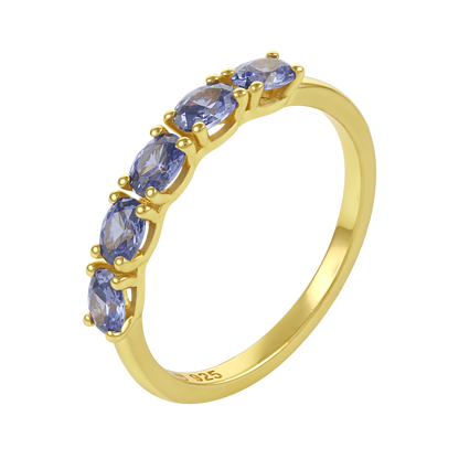White Background - Close-up of KiraKira Stackable Rings | 925 Silver Gold-Plated sapphire from Nishani’s Kira Kira festive collection — handcrafted multicolour stones jewelry, ring in gold-plated 925 silver.