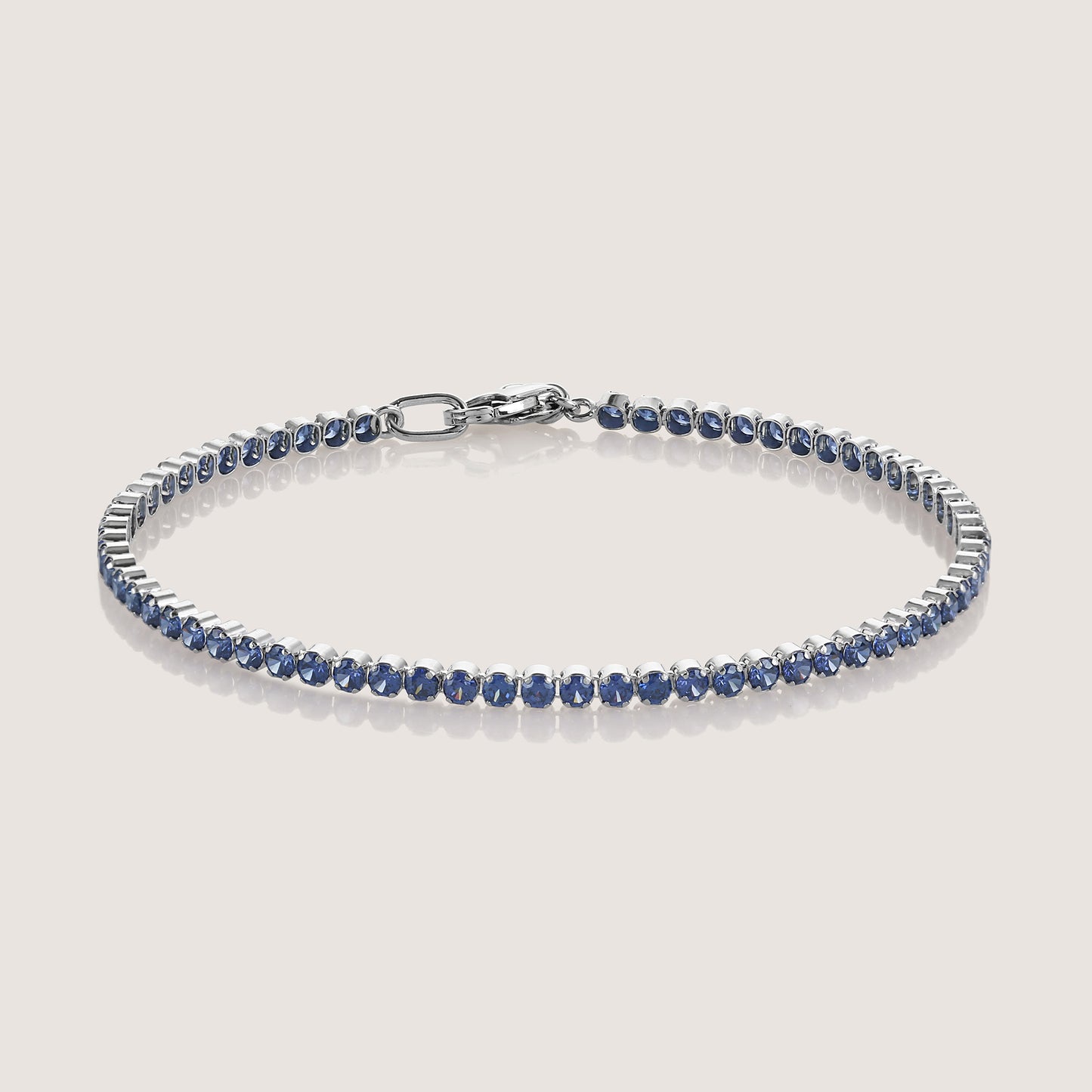 White Background - Close-up of KiraKira Tennis Bracelet Blue | 925 Silver Gold & Rhodium-Plated from Nishani’s Kira Kira festive collection — handcrafted bracelet in gold-plated 925 silver.
