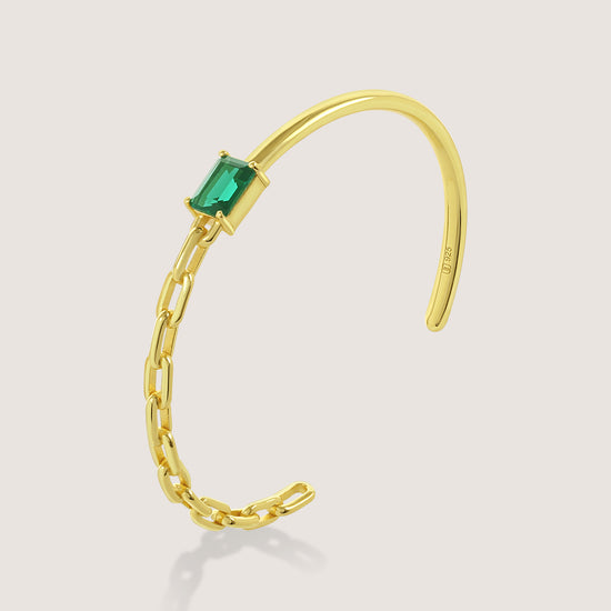 White Background - Front of KiraKira Emerald Cuff | 925 Silver Gold-Plated from Nishani’s Kira Kira festive collection — handcrafted emerald jewelry, bracelet in gold-plated 925 silver.
