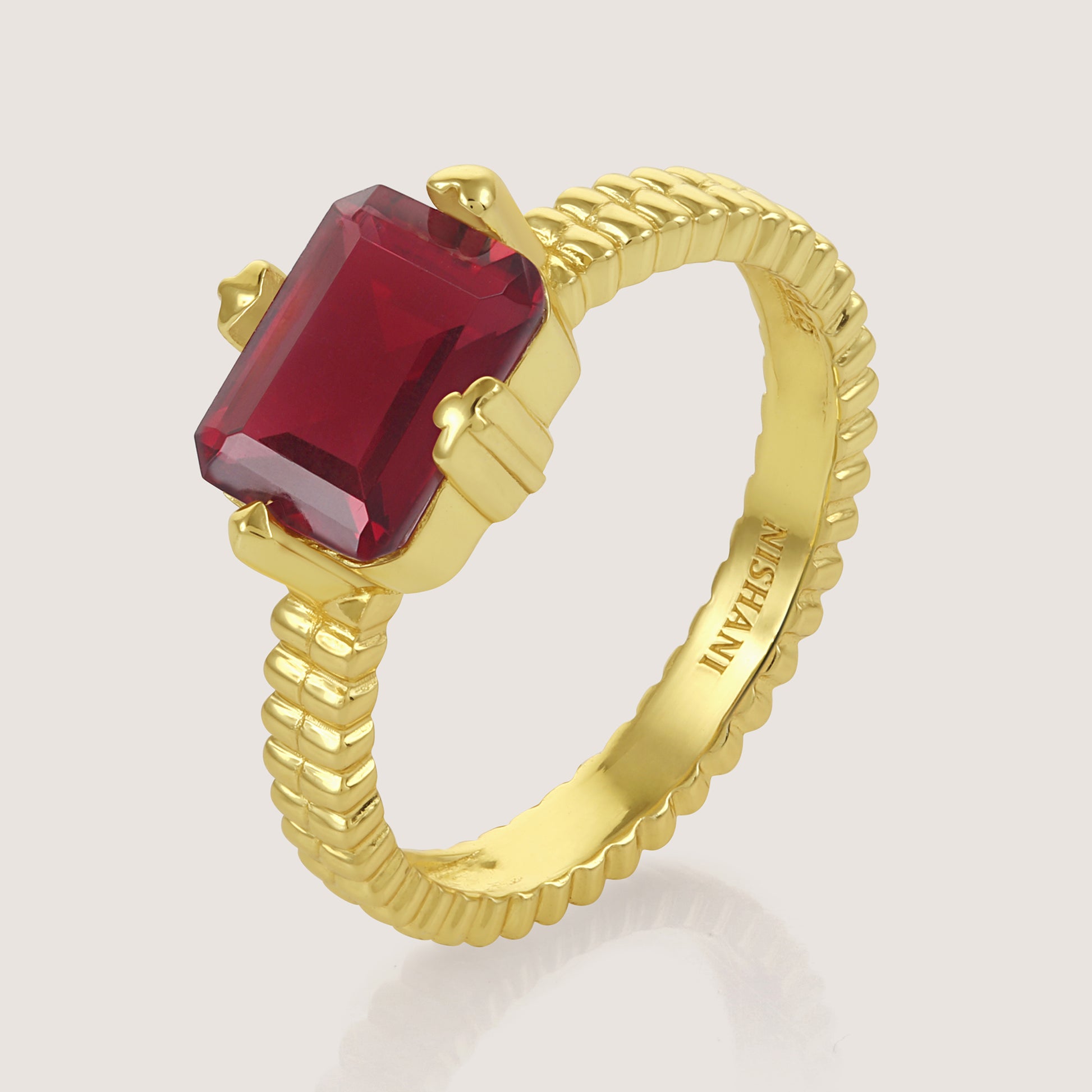 White Background - Front of KiraKira Ruby Suits Ring | 925 Silver Gold-Plated from Nishani’s Kira Kira festive collection — handcrafted ruby jewelry, ring in gold-plated 925 silver.