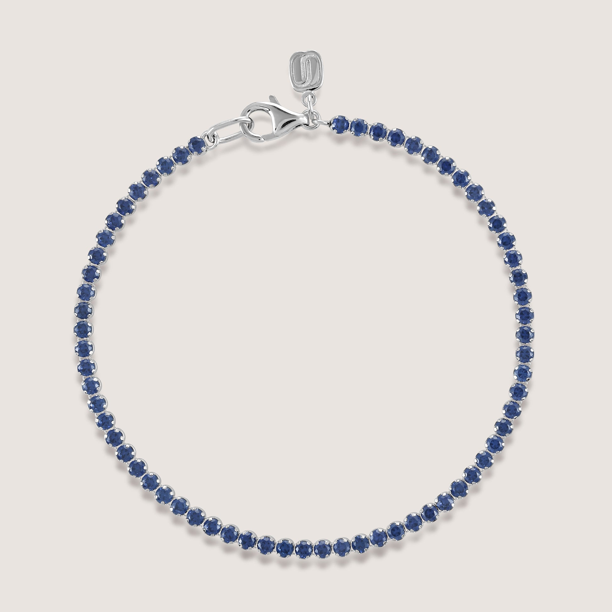 White Background - Front of KiraKira Tennis Bracelet Blue | 925 Silver Gold & Rhodium-Plated from Nishani’s Kira Kira festive collection — handcrafted bracelet in gold-plated 925 silver.