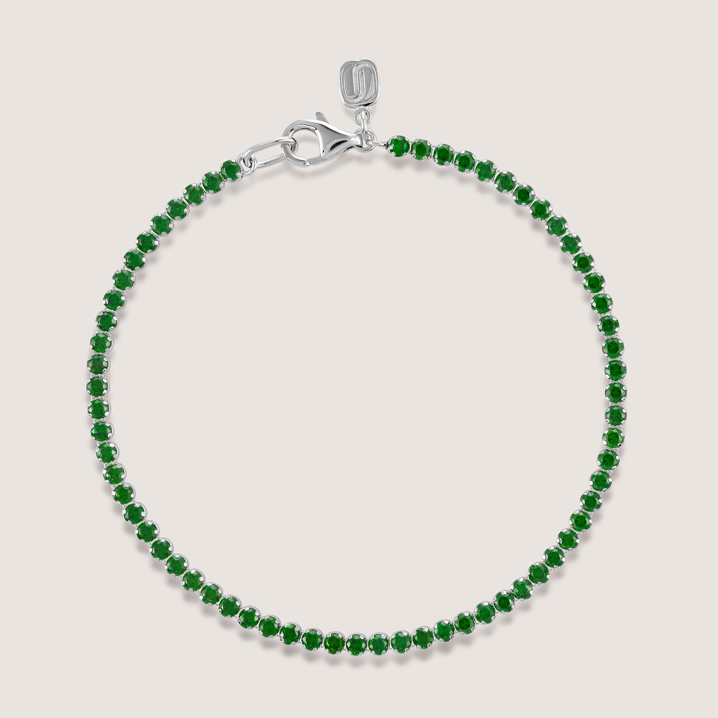 White Background - Front of KiraKira Tennis Bracelet Green | 925 Silver Gold & Rhodium-Plated from Nishani’s Kira Kira festive collection — handcrafted bracelet in gold-plated 925 silver.