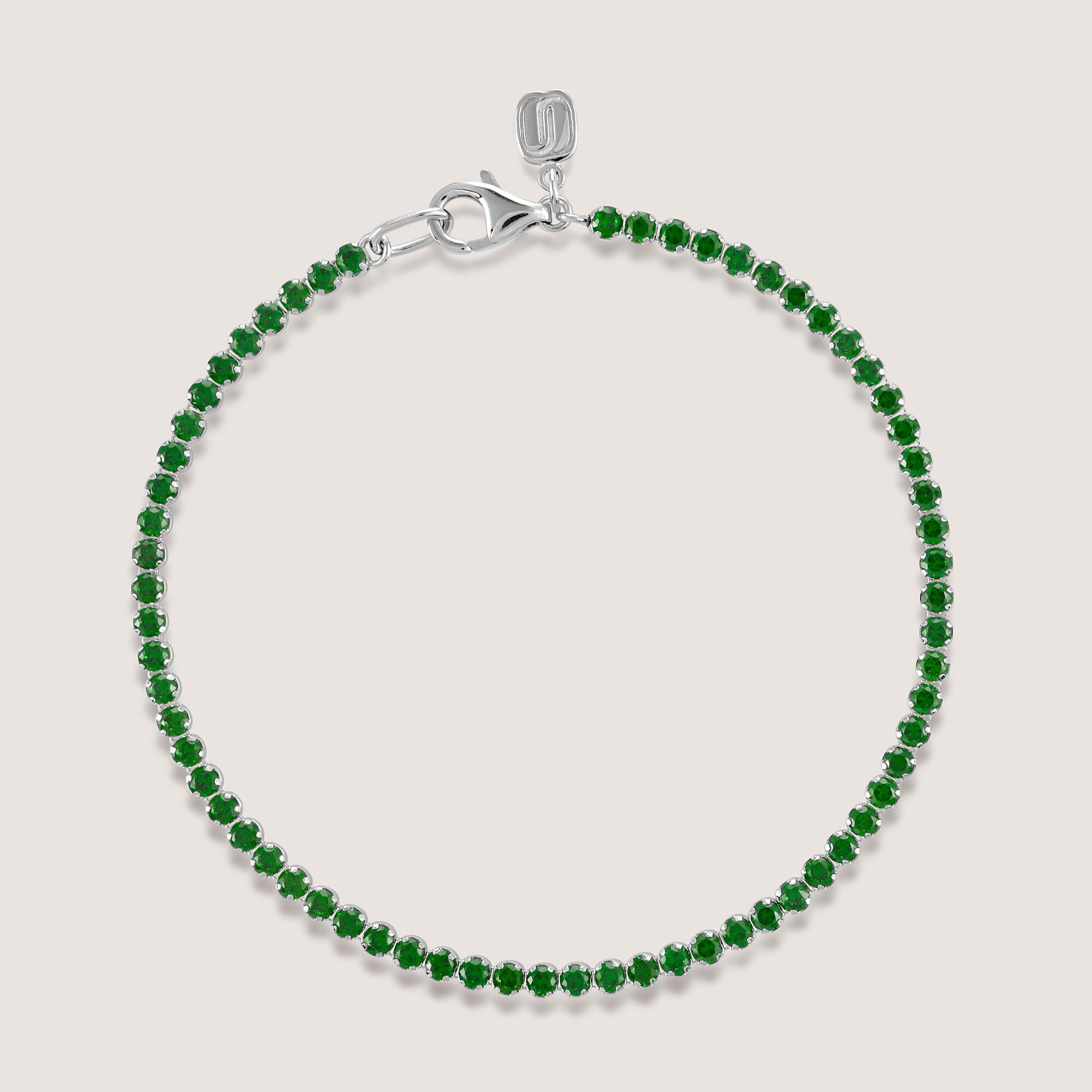 White Background - Front of KiraKira Tennis Bracelet Green | 925 Silver Gold & Rhodium-Plated from Nishani’s Kira Kira festive collection — handcrafted bracelet in gold-plated 925 silver.